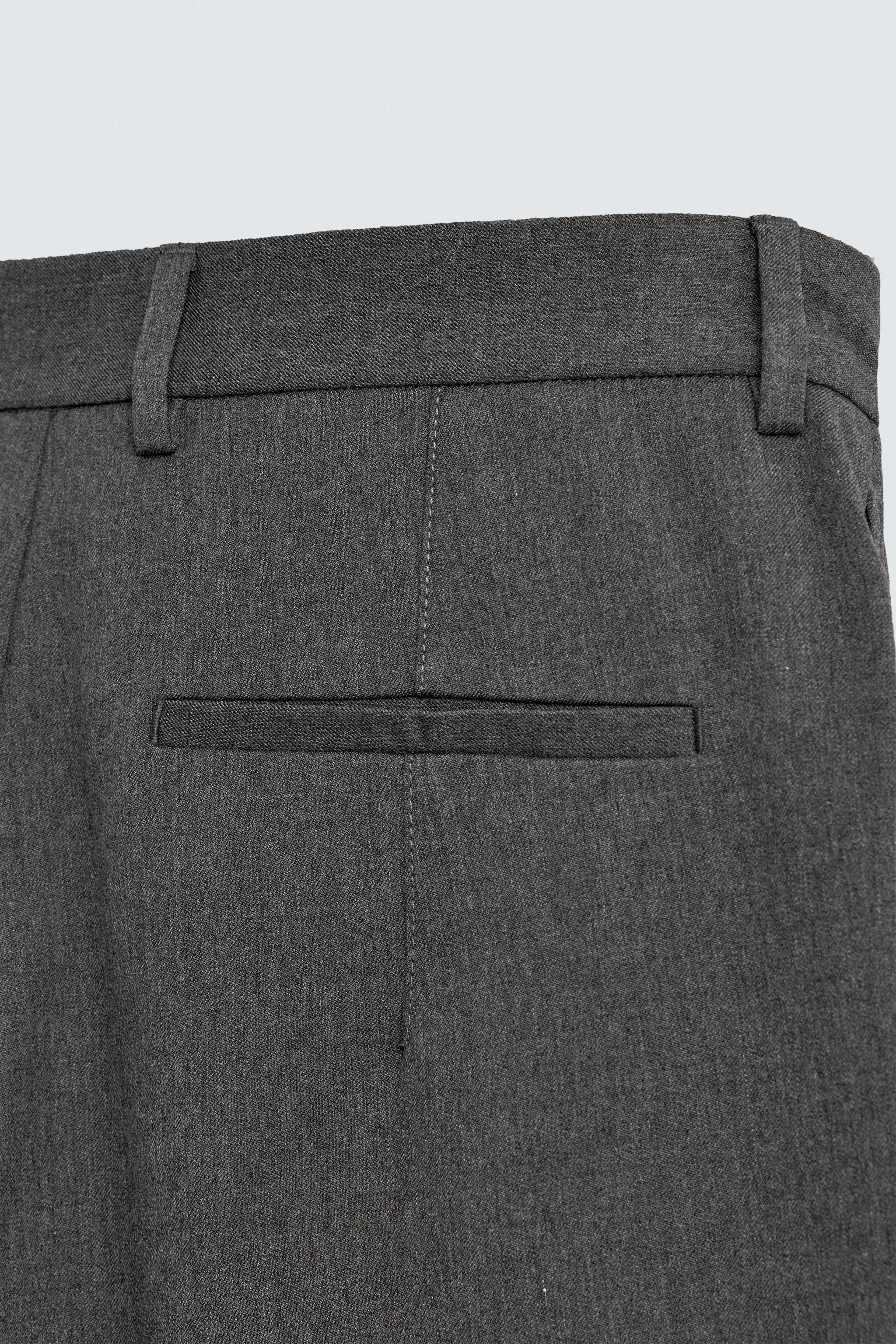 PANTALON À PLIS RAYURES